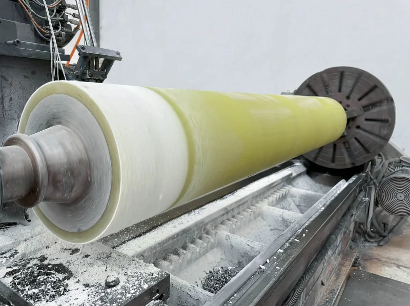 light yellow industrial roller on lathe