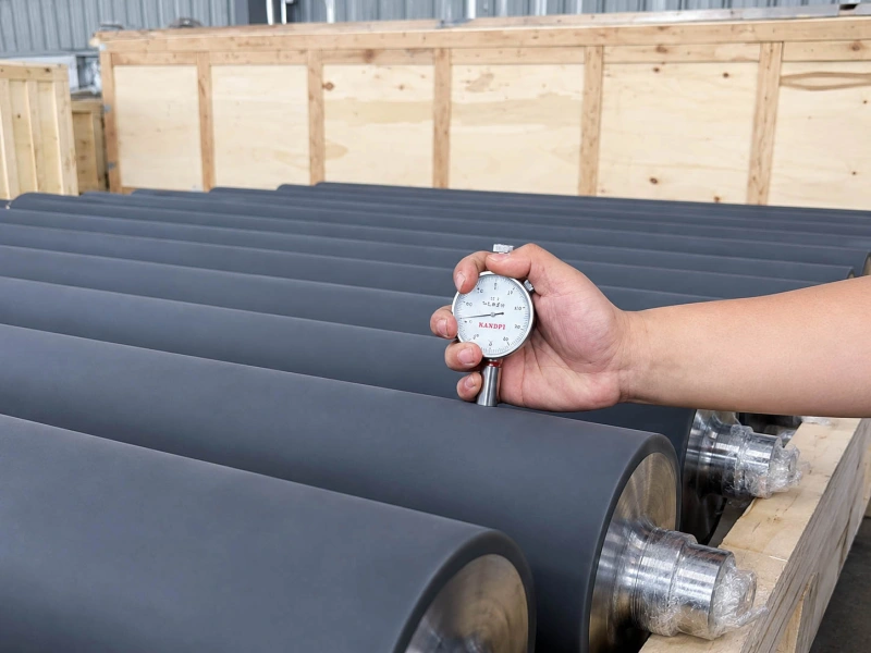 EPDM rubber rollers undergoing Shore hardness testing